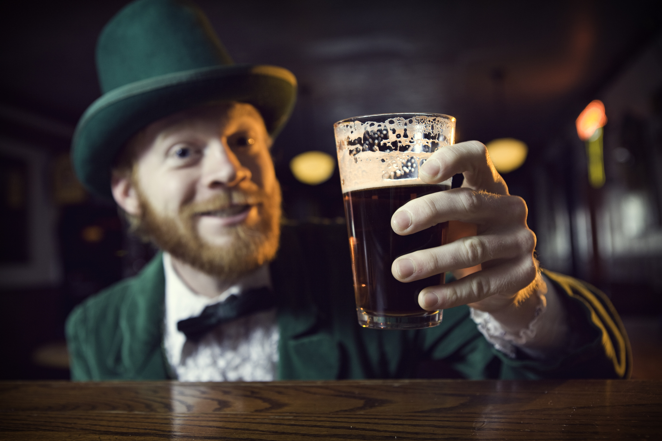 Irish Character / Leprechaun Making a Toast with Beer